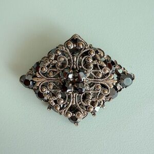 Vintage Filigree Brooch with Dark Stones